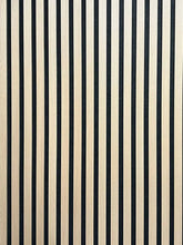 Wooden surface with black and beige vertical stripes