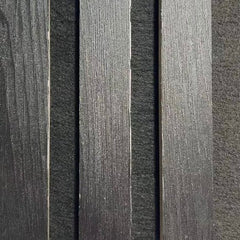 Close-up of textured stone slabs with horizontal lines