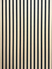 Wooden surface with black and beige vertical stripes